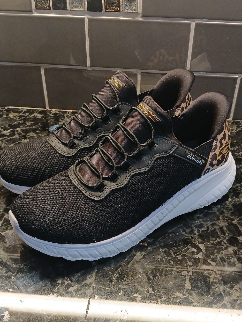 Womens, Like-new, Skechers Black Slip-On Sneakers w/ Leopard Heel Accent, Size 9
